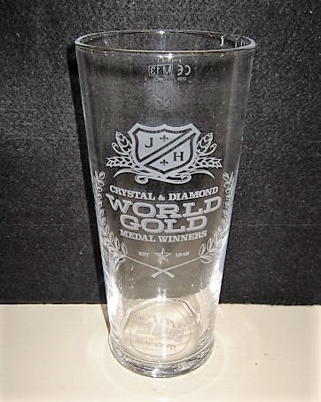 beer glass from the Joseph Holt brewery in England with the inscription 'JH Crystal Dimond World Gold Medal Winners. EST 1849'