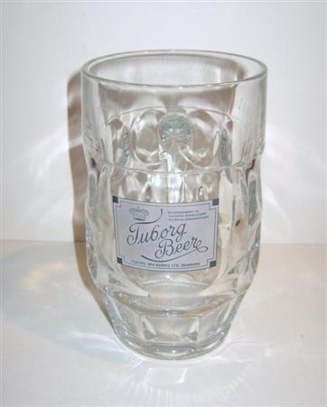 beer glass from the Tuborg brewery in Denmark with the inscription 'By Appointment To The Royal Danish Court. The Royal Swedish Court. Turborg Beer Tubourg Breweries Ltd Denmark  '