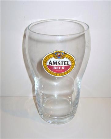beer glass from the Amstel brewery in Netherlands with the inscription 'Amstel Beer Lager. Quality Product. Amstel Lager All Over The World '