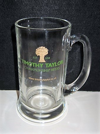 beer glass from the Timothy Taylor brewery in England with the inscription 'Est 1858 Timothy Taylor Championship Beers. www.timothytaylor.co.uk '