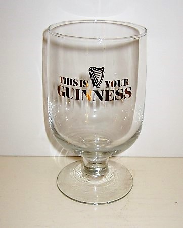 beer glass from the Guinness  brewery in Ireland with the inscription 'This Is Your Guinness'