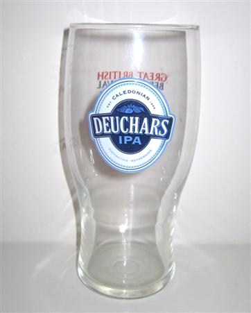 beer glass from the Caledonian  brewery in Scotland with the inscription 'Caledonian Est 1869 Deuchars IPA Distinctive Refreshing'