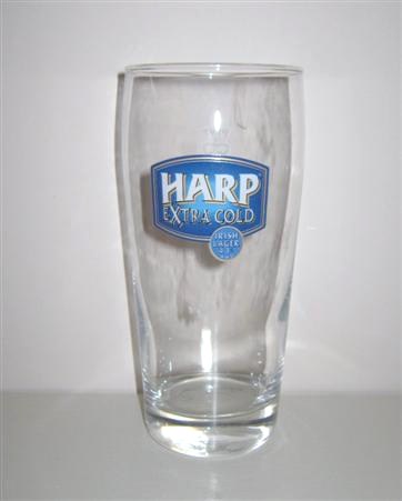 beer glass from the Guinness  brewery in Ireland with the inscription 'Harp Extra Cold Irish Lager 4.3% ABV'