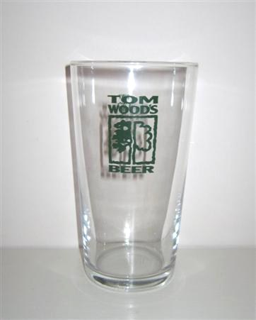 beer glass from the Tom Wood brewery in England with the inscription 'Tom Wood's Beer'