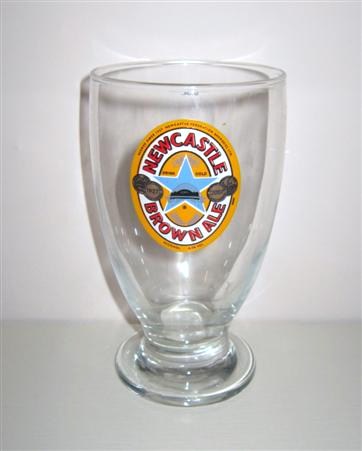 beer glass from the Newcastle Breweries  brewery in England with the inscription 'Newcastle Brown '