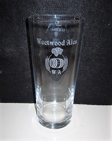 beer glass from the Weetwood Ales brewery in England with the inscription 'Weetwood Ales'