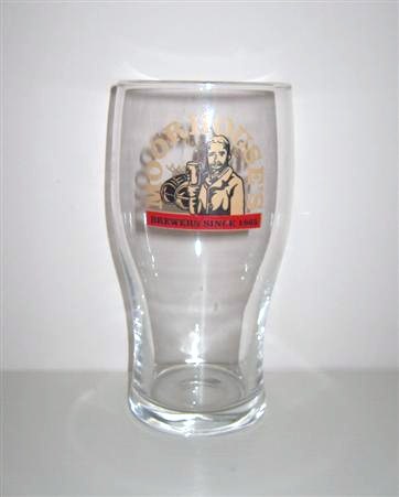 beer glass from the Moorhouse's brewery in England with the inscription 'Moorhouse's Brewers Since 1865'
