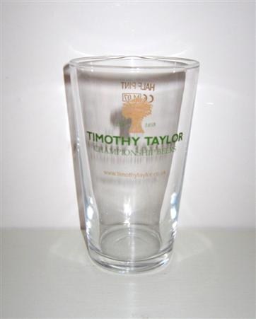 beer glass from the Timothy Taylor brewery in England with the inscription 'Timothy Taylor Campionship Beer. www.timothytaylor.co.uk  '