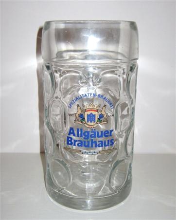 beer glass from the Allgauer Brauhaus brewery in Germany with the inscription 'Spezialitaten Brauerei Seit 1394 Allgauer Brauhaus'