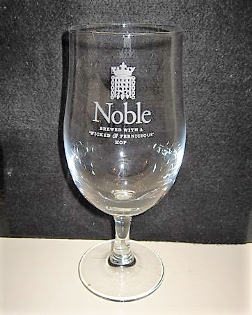 beer glass from the Greene King brewery in England with the inscription 'Noble Brewed With A Wicked And Pernicious Hop'