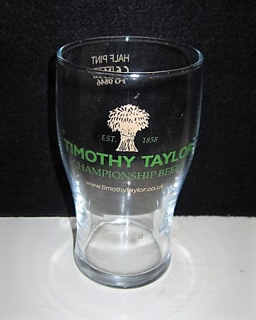 beer glass from the Timothy Taylor brewery in England with the inscription 'Timothy Taylor Campionship Beer www.timothytaylor.co.uk  '