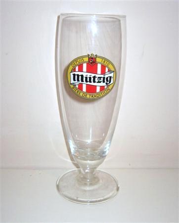 beer glass from the Mutzig brewery in France with the inscription 'Mutzig. Depuis 1810 Biere De Tradtion'