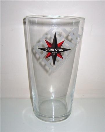 beer glass from the Dark Star Brewing Co brewery in England with the inscription 'Dark Star Brewing Co. Beer From The Heart Of Sussex'