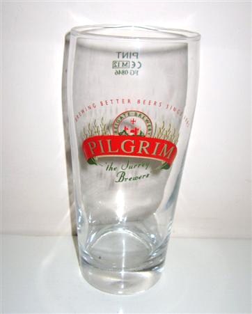 beer glass from the Pilgrim brewery in England with the inscription 'Pilgrim, The Surrey Brewer's. Brewing Better Beers Since. 1982 Rigate Brewery'