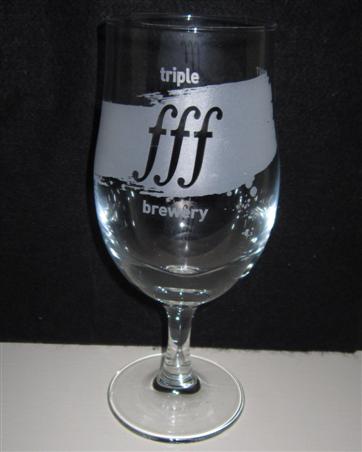 beer glass from the Triple FFF brewery in England with the inscription 'Tripple FFF Brewery'