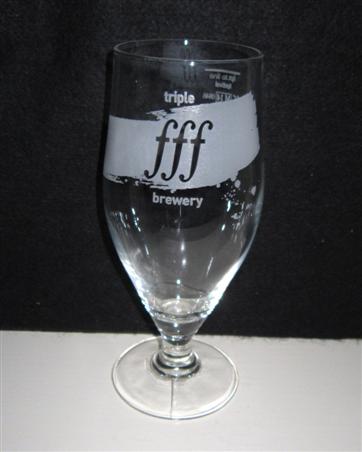 beer glass from the Triple FFF brewery in England with the inscription 'Tripple FFF Brewery'