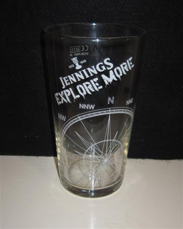 beer glass from the Jennings brewery in England with the inscription 'Estd 1828 Jennings Explore More'