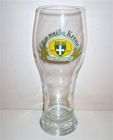 beer glass from the Das Weibe Kreuz brewery in Germany with the inscription 'Front-das weibe Kreuz private Spezialitaten Brauerei Seit 1692. Seit 1692. Weissbier.'
