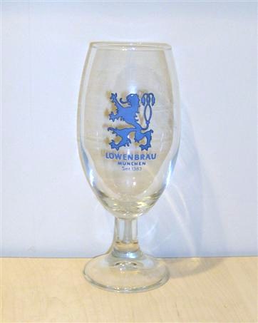 beer glass from the Lowenbrau brewery in Germany with the inscription 'Lowenbrau Munchen Seit 1383'