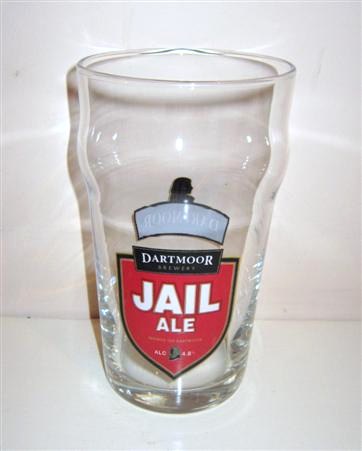 beer glass from the Dartmoor Brewery  brewery in England with the inscription 'Dartmore Brewery. Jail Ale. Ale Brewed On Dartmore'