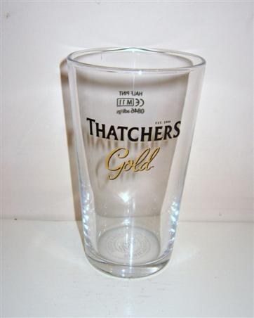 beer glass from the Thatchers brewery in England with the inscription 'Thachers Gold'