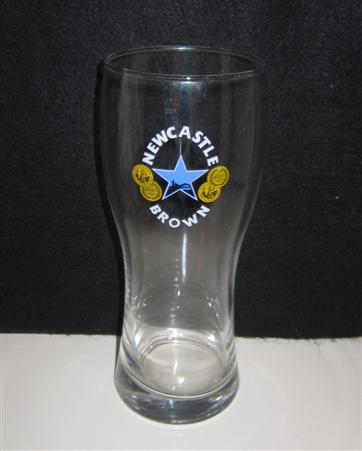 beer glass from the Newcastle Breweries  brewery in England with the inscription 'Newcastle Brown'