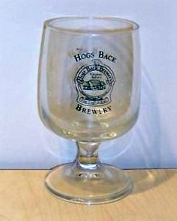 beer glass from the Hogs Back brewery in England with the inscription 'Hogs Back Hogs Back Brewery Tongham Surrey Fine English Ales Berwery'