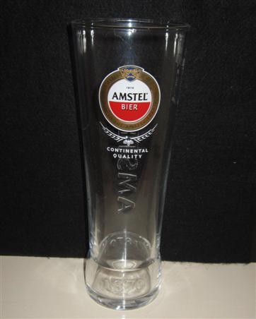 beer glass from the Amstel brewery in Netherlands with the inscription 'Amstel Bier, Brewed To The Amstel Tradition 1870 Amstel Bier Continental Quality'