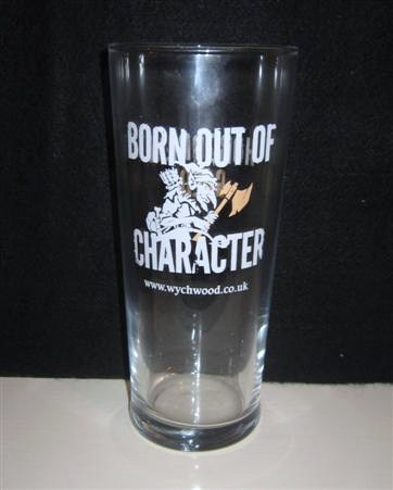 beer glass from the Wychwood  brewery in England with the inscription 'Born Out Of Character. www.wychwood.co.uk'