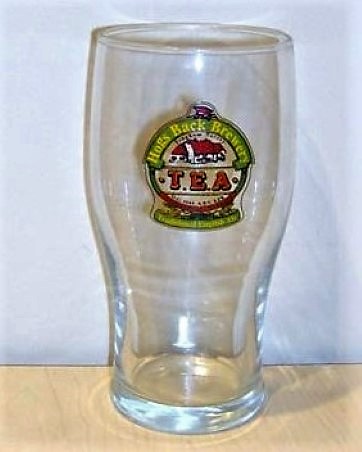beer glass from the Hogs Back brewery in England with the inscription 'Hogs Back Brewery Tongham Surrey T.E.A Inderpendent Brewers Traditional English Ale'