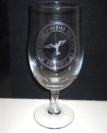 beer glass from the Firebird  brewery in England with the inscription 'Firebird Brewing Co, Firebird Brewing Co'