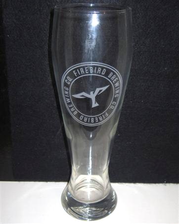 beer glass from the Firebird  brewery in England with the inscription 'Firebird Brewing Co, Firebird Brewing Co'