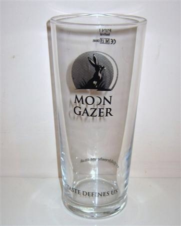 beer glass from the Norfolk Brewhouse brewery in England with the inscription 'Moon Grazer, Taste Defines Us'
