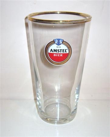 beer glass from the Amstel brewery in Netherlands with the inscription '1870 Amstel Bier Amstel Bieren Volgens De Amstel Traditie Gebrouwen'