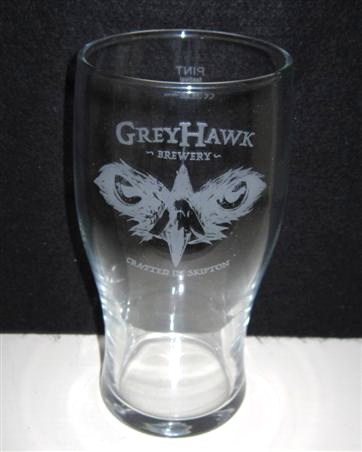 beer glass from the Grey Hawk brewery in England with the inscription 'Grey Hawk Brewery, Crafted In Skipton'