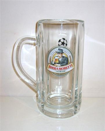 beer glass from the Moretti brewery in Italy with the inscription 'Birra Moretti Dal 1859, Qualitae Tradrione'