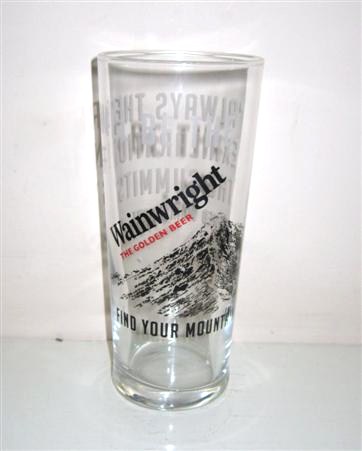 beer glass from the Thwaites brewery in England with the inscription 'Wainwright The Golden Beer, Find Your Mountain'