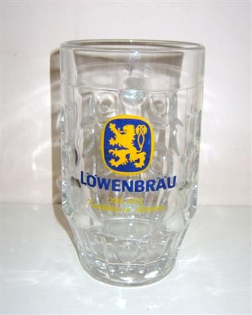 beer glass from the Lowenbrau brewery in Germany with the inscription 'Lowenbrau Seit 1383 Tradition In Munchen'