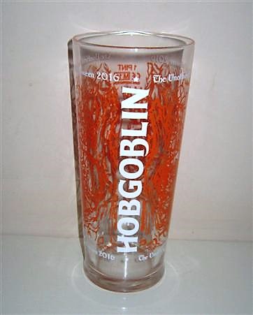 beer glass from the Wychwood  brewery in England with the inscription 'Hobgoblin, The Onifical Beer Of Halloween 2016'