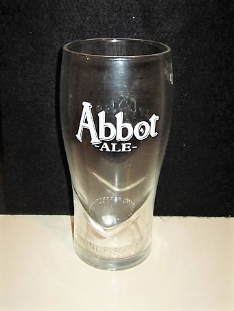beer glass from the Greene King brewery in England with the inscription 'Abbot Ale, Brewing Perfection'
