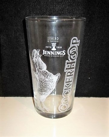 beer glass from the Jennings brewery in England with the inscription 'Estd 1828 Jennings Award Winning Ale, Cockerhoop'
