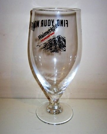 beer glass from the Thwaites brewery in England with the inscription 'Wainwright, The Golden Ale'