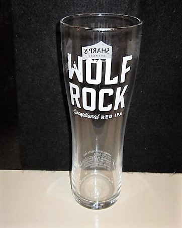 beer glass from the Sharp's brewery in England with the inscription 'Wolf Rock, Exceptional Red IPA'