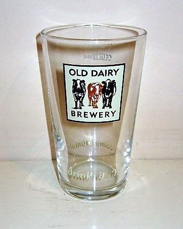 beer glass from the Old Dairy brewery in England with the inscription 'Old Dairy Brewery, Drink It Til The Cowes Come Home'