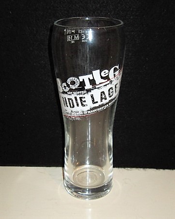 beer glass from the Bootleg  brewery in England with the inscription 'Bootleg. Dry Hopped Indie Lager, Brewed In Manchester With Attitude'