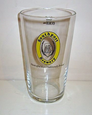 beer glass from the Southport  brewery in England with the inscription 'Southport Brewery, Handcrafted Beers Traditionally Brewed'