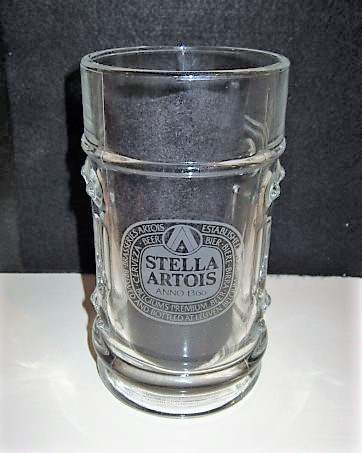 beer glass from the Stella Artois brewery in Belgium with the inscription 'Stella Artois Anno 1366, Established In 1366 Brewed And Bottled At Leuven Belguim Brasseries Artois '