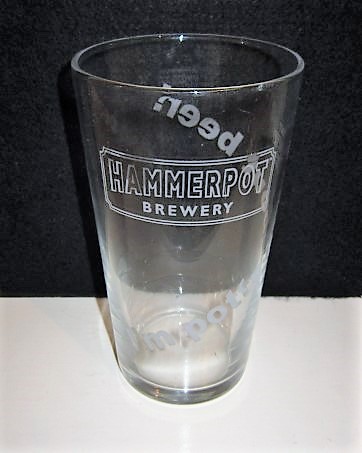 beer glass from the Hammerpot  brewery in England with the inscription 'Hammerpot Brewery, I'm Pottey About Beer!'