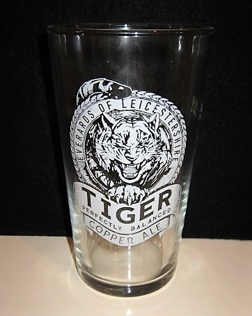 beer glass from the Everards brewery in England with the inscription 'Tiger Copper Ale, Perfectly Balanced'