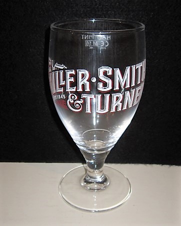 beer glass from the Fuller's brewery in England with the inscription 'Fuller,Smith&Turner EST 1845'